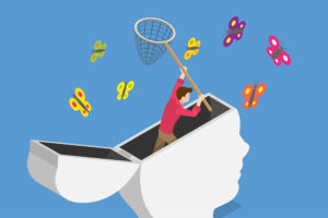 Drawing of a person's head with its "lid" hinged open and a man standing inside catching butterflies