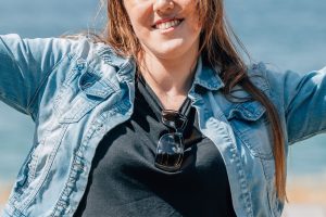 Woman on beach with sunglasses