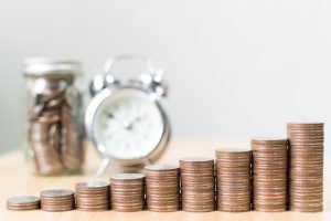 Stacks of coins arranged to look like a series of steps.